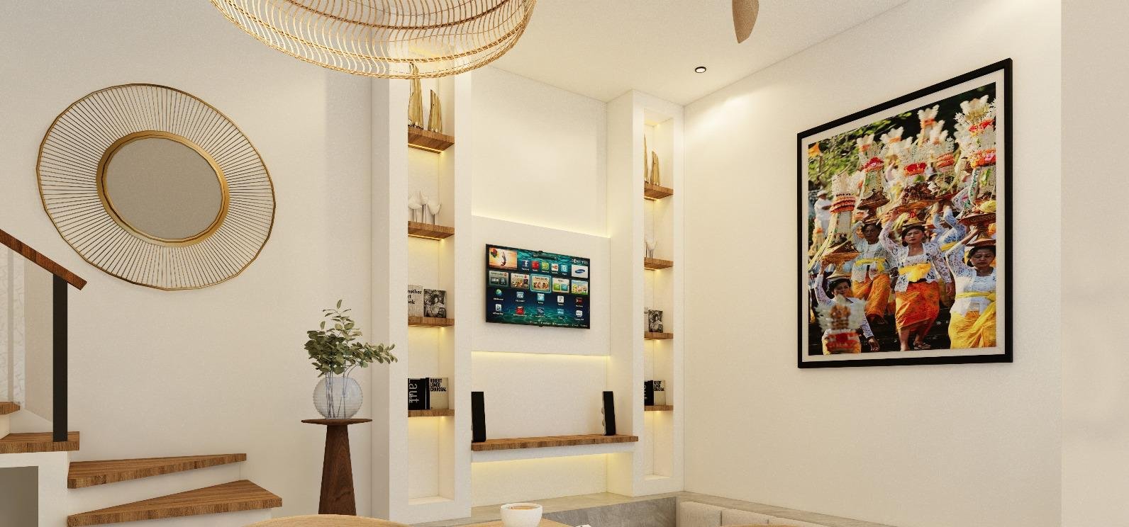 Bright modern living room in a Bali villa featuring a wall-mounted TV, back-lit built-in shelving, a large vibrant Balinese artwork, and a decorative sunburst mirror.
